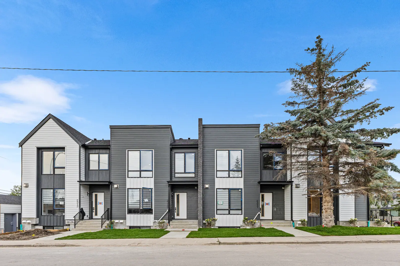 1701–1703 23 Avenue NW, Capitol Hill — four rental homes over their own lower suites